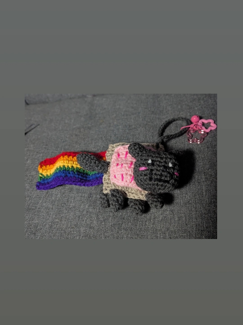 Handmade Gray Crochet Cat Keychain with Rainbow Tail